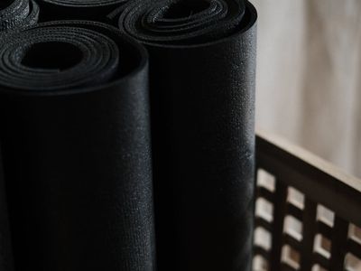 Yoga mat and accessories in a modern studio setting
